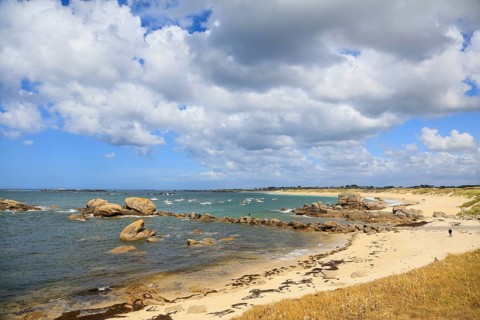 Former village of Meneham on the Atlantic coast with partly thatched houses between granite rocks,