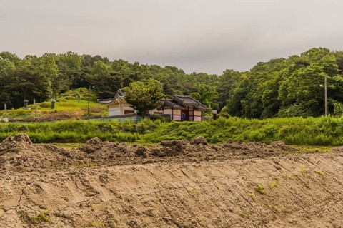 Daejeon, South Korea, May 22, 2018: Korean building with perimeter wall and ceramic tile roof in