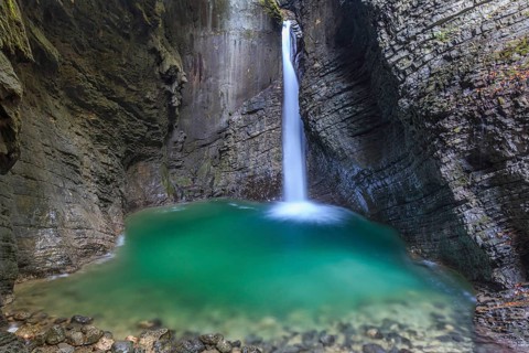 Waterfall in a gorge, Kozjak waterfall, Soca Valley, Slovenia, Europe