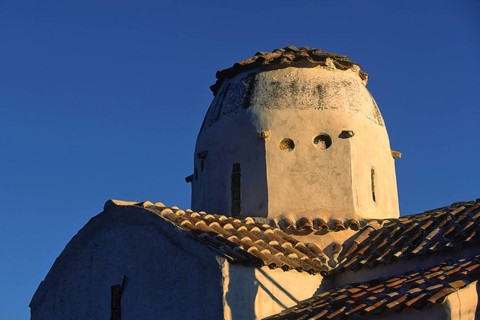Scan, Old church tower in warm evening light with classic Mediterranean design, Aradena Gorge,
