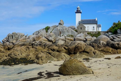 Lighthouse and beach at the Pointe de Pontusval, Plouneour-Brignogan-Plage, department Finistere