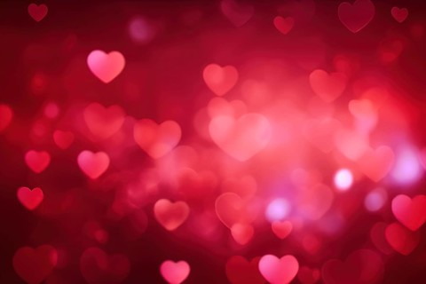 A romantic and dreamy background featuring heart-shaped bokeh lights, perfect for Valentine's Day