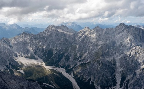 View of Wimbachgries valley and mountain panorama with rocky mountain peak of the Hochkalter, at
