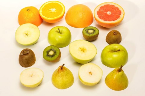 Fresh fruit cut in half. citrus fruits, lime, lemon, orange, grapefruit isolated on white
