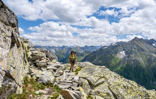 Mountaineer on hiking trail, Berliner Hoehenweg, mountain panorama with summit Grosser Ingent,