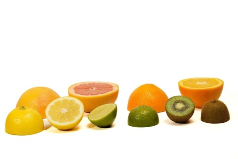 Fresh fruit cut in half. citrus fruits, lime, lemon, orange, grapefruit isolated on white