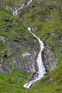 Waterfall on a green mountainside, Berliner Hoehenweg, Zillertal Alps, Tyrol, Austria, Europe