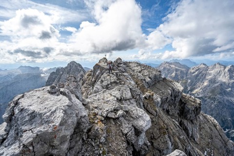 Rocky mountain peak on a narrow ridge, summit of the Watzmann Mittelspitze, Watzmann crossing,