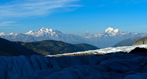 View from the Great Aletsch Glacier to the mountain chain of the Valais Alps with the peaks