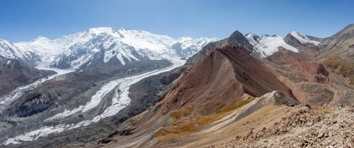 High mountain landscape with glacier moraines and glacier tongues, glaciated and snow-covered