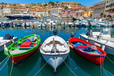 Fishing boats and luxury yachts in the harbour of Portoferraio, Elba, Tuscan Archipelago, Tuscany,