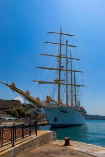 Four-masted sailing yacht Star Clipper anchored in the harbour of Portoferraio, Elba, Tuscan