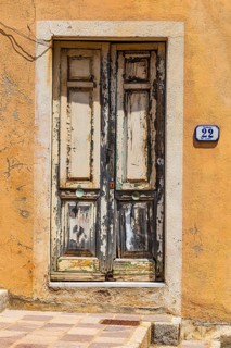 Old weathered front door, Rio Marina, Elba, Tuscan Archipelago, Tuscany, Italy, Europe