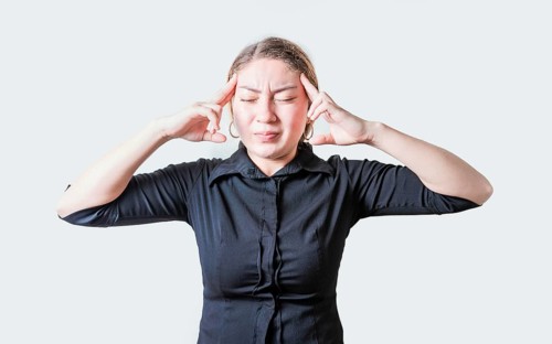 People suffering from migraine on isolated background. Headache concept. Young woman with headache