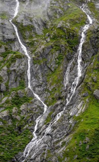 Mountain stream flowing down a steep rocky slope, waterfall, Berliner Hoehenweg, Zillertal, Tyrol,