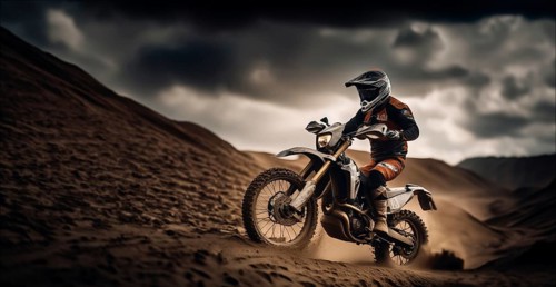 Motocross on an enduro motorcycle through mud and sand, a motorcyclist in gear and a helmet rides