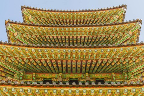 Buyeo, South Korea, July 7, 2018: Eves of colorful Buddhist five story pagoda at Neungsa Baekje