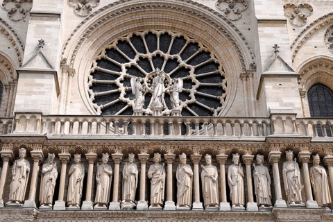Figures of saints, detail on the Gothic entrance portal of Notre Dame de Paris Cathedral, Paris,