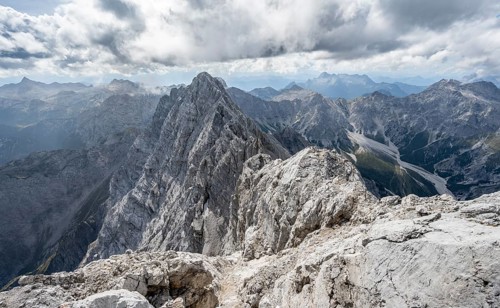 Rocky, narrow mountain ridge with Watzmann Suedspitze, view from Watzmann middle summit to mountain
