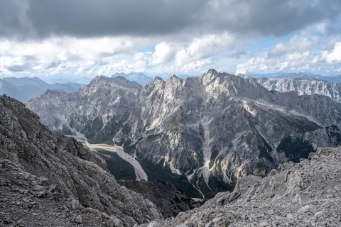 View of Wimbachgries valley and mountain panorama with rocky mountain peak of the Hochkalter, at