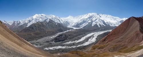 High mountain landscape with glacier moraines and glacier tongues, glaciated and snow-covered