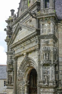Side portal of the church, Enclos Paroissial parish of Guimiliau, Finistere Penn ar Bed department,