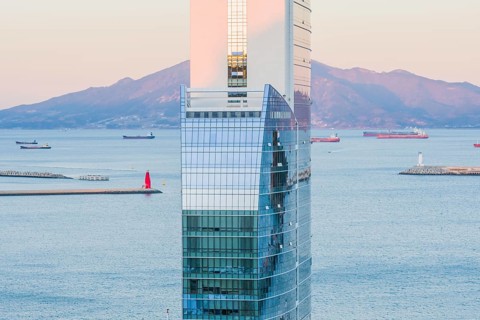 Yeoso, South Korea: December 25, 2017: Top of the MVL hotel with mountains and the harbor full of