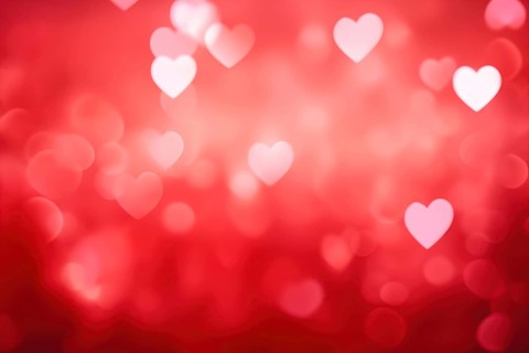 A romantic and dreamy background featuring heart-shaped bokeh lights, perfect for Valentine's Day