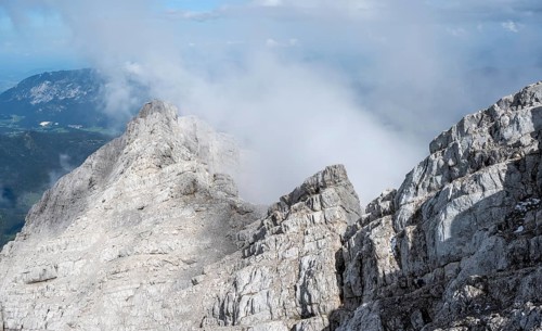 Rocky mountain ridge with clouds, Watzmann crossing, at the summit of the Watzmann Mittelspitze,