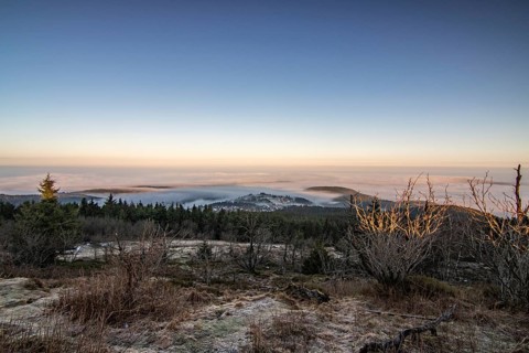 Landscape on the Grosser Feldberg, Taunus volcanic region. A cloudy, sunny winter day, meadows,