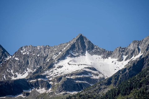 Rocky summit Kleiner Greiner with snow, Zillertal Alps, Tyrol, Austria, Europe