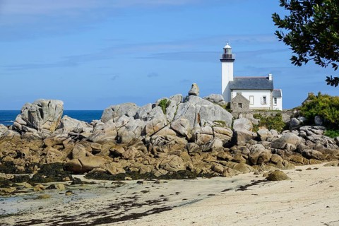 Lighthouse and beach at the Pointe de Pontusval, Plouneour-Brignogan-Plage, department Finistere