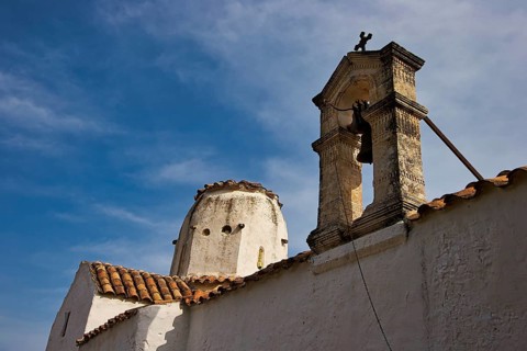 Church of St Michael the Archangel, Cross-domed church, The white bell tower of a church rises into