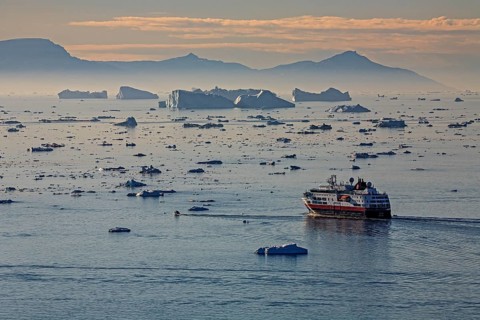 Hurtigruten ship in front of icebergs, reflection, midnight sun, summer, Ilulissat Icefjord, Disko