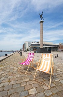 Deckchairs on the quay promenades, Helsingborg, Skane laen, Sweden, Europe