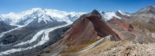 High mountain landscape with glacier moraines and glacier tongues, glaciated and snow-covered