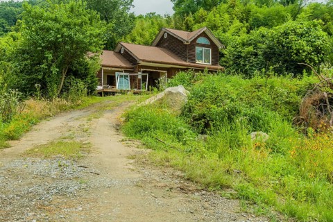 Daejeon, South Korea, June 29, 2018: Vacant two story house abandoned in countryside, Asia