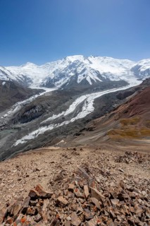 High mountain landscape with glacier moraines and glacier tongues, glaciated and snow-covered