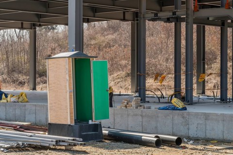 Chungju, South Korea, March 22, 2020: For editorial use only. Port-a-potty with open door at