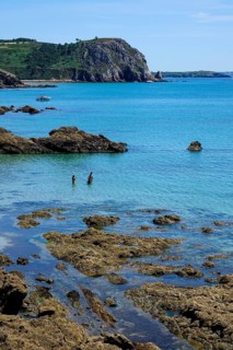 Pointe de Treboul rock formation in the Baie de Douarnenez bay seen from the Ile de l'Aber, Crozon