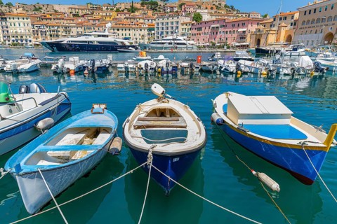 Fishing boats and luxury yachts in the harbour of Portoferraio, Elba, Tuscan Archipelago, Tuscany,
