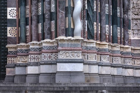 Decorative bases of the columns on the entrance facade of San Lorenzo Cathedral, opened in 1098,