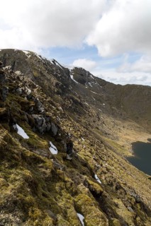 Helvellyn mountain peak and Red Tarn corrie lake, Lake District, Cumbria, England, UK