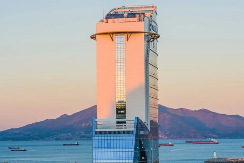 Yeoso, South Korea: December 25, 2017: Top of the MVL hotel with mountains and the harbor full of