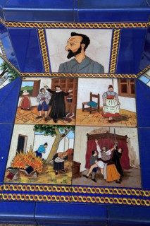 Ceramic tiles on street furniture seat scenes from Cervantes Don Quixote story, Algeciras, Spain,