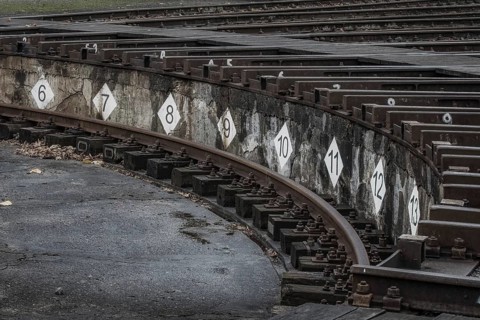 Numbered signs on the platform edge of a railway museum mark the tracks, Dahlhausen railway depot,