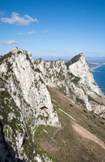 Sheer white rock mountainside the Rock of Gibraltar, British territory in southern Europe