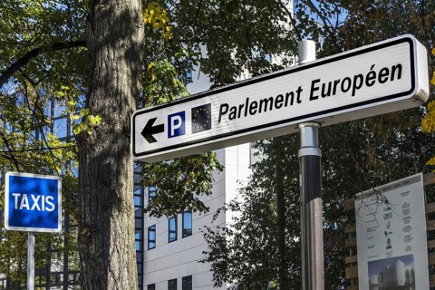 Signpost with directions to the European Parliament in the European quarter at Strasbourg, France,