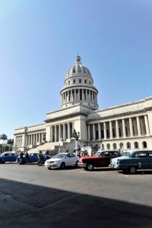 Vintage car from the 1950s in front of the Capitolio Nacional, a building in the neoclassical