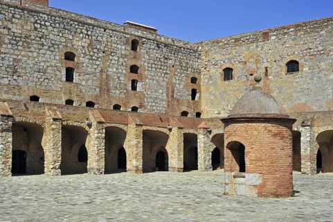 Inner court and well of the Catalan fortress Fort de Salses at Salses-le-Chateau, Pyrenees, France,
